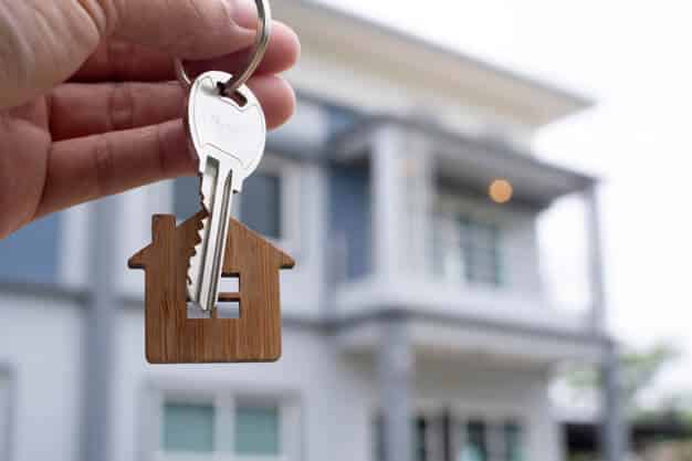 landlord unlocks house key new home real estate agents sales agents 112699 358 1