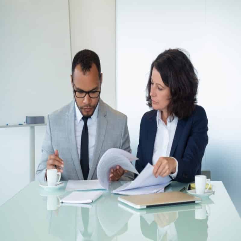 business-colleagues-checking-agreement-text_1262-20982 (1)